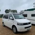 A white Danbury T5 based Transporter Campervan Conversion