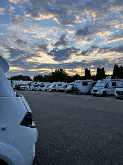 A shot of a Stellplatz, full with Motorhomes in Germany