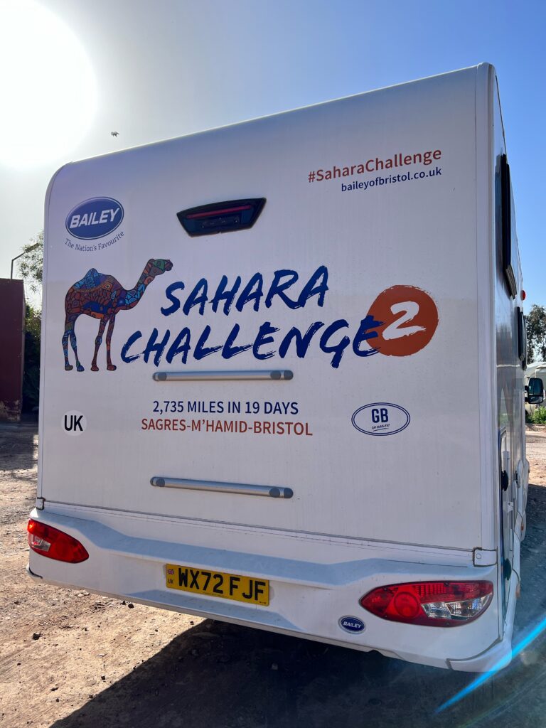 The rear of a Bailey Adamo with the Sahara Challenge 2 livery on